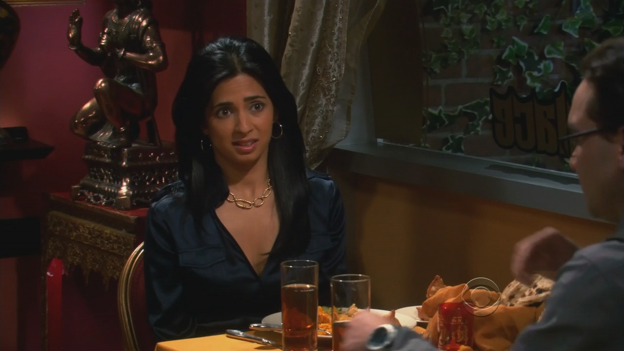 Aarti Mann is seen as her character Priya Koothrappali wearing a dark blue ...