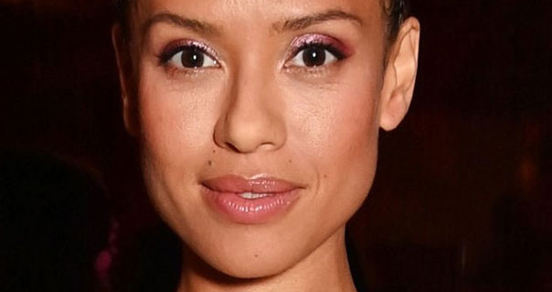 A close-up portrait of Gugu Mbatha-Raw with a dark background at the 2023 Bulgari Gala.