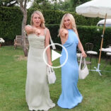 Em Sheldon dances with Freddy Cousin-Brown during Josie Fear's wedding. Em points at the camera. She wears a light blue satin halter neck gown.
